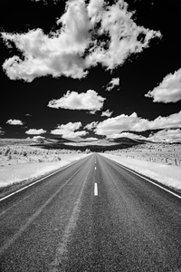 Rural Majesty Unveiled: Montanas Highway Horizon in Black and White Infrared Splendor