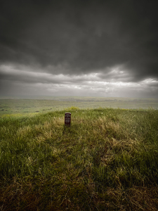 Storming Headstone: A Heroic Quest Through Eastern Montanas Battlefield Amidst Torrential Downpour