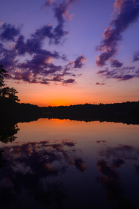 Enchanted Horizon: Capturing the Magic of Sunset at Killens Pond by Dream World Images
