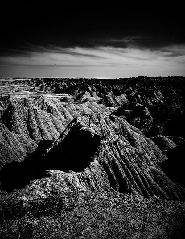 Shadows of the Earth: A Shadowy Ethereal Dance in the Badlands Print