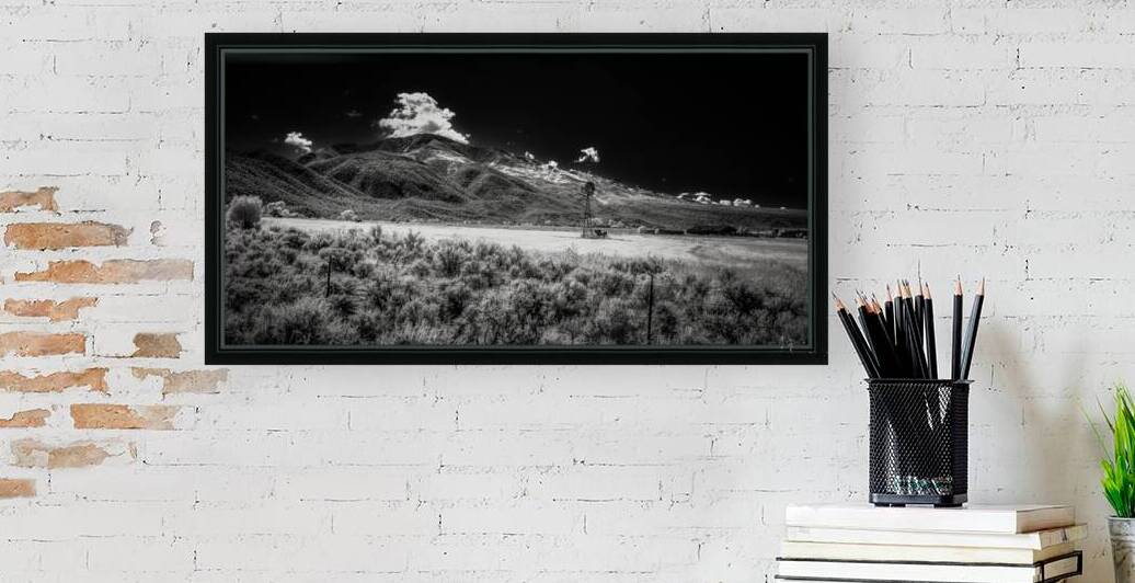 Isolated Windmill Beneath Rugged Peaks by Dream World Images