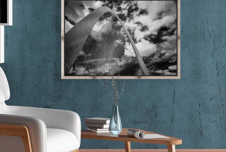 Sculpted Arch Amidst Dynamic Clouds by Dream World Images