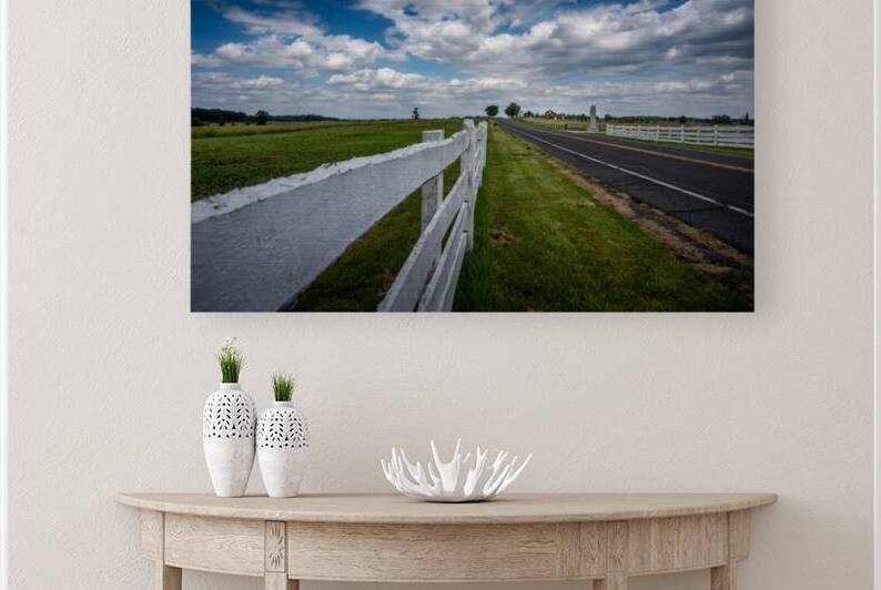 Fence along the road by Dream World Images