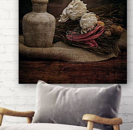 Rustic Elegance: Old Wooden Jar on Burlap with Flowers Reeds by Dream World Images