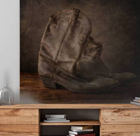 Worn Elegance: Weathered Cowboy Boots in Rustic Splendor by Dream World Images