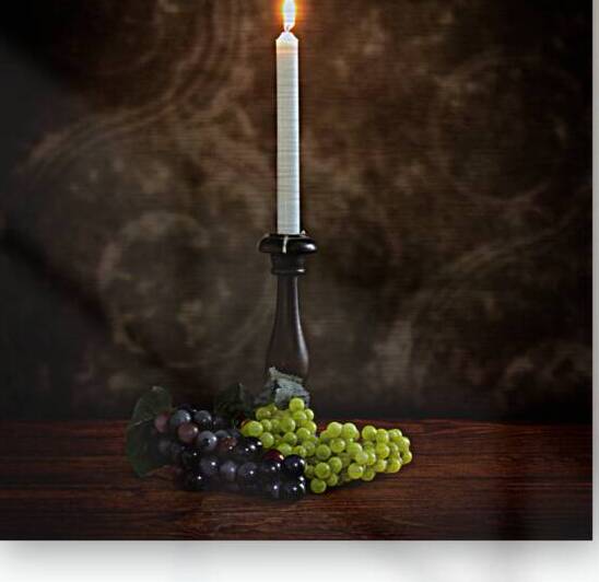 Vintage Illumination: Antique Candlestick with Grapes and Flame by Dream World Images